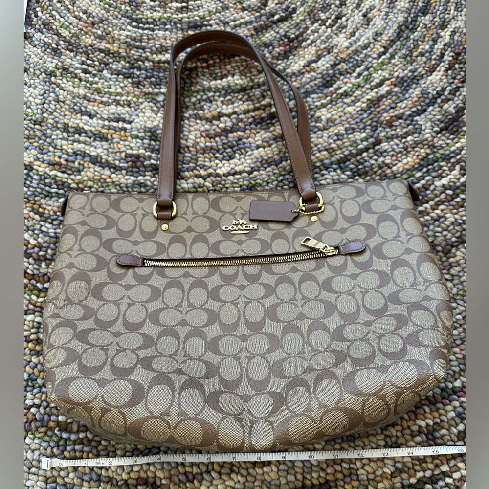 Brand new Coach coded leather tote ￼